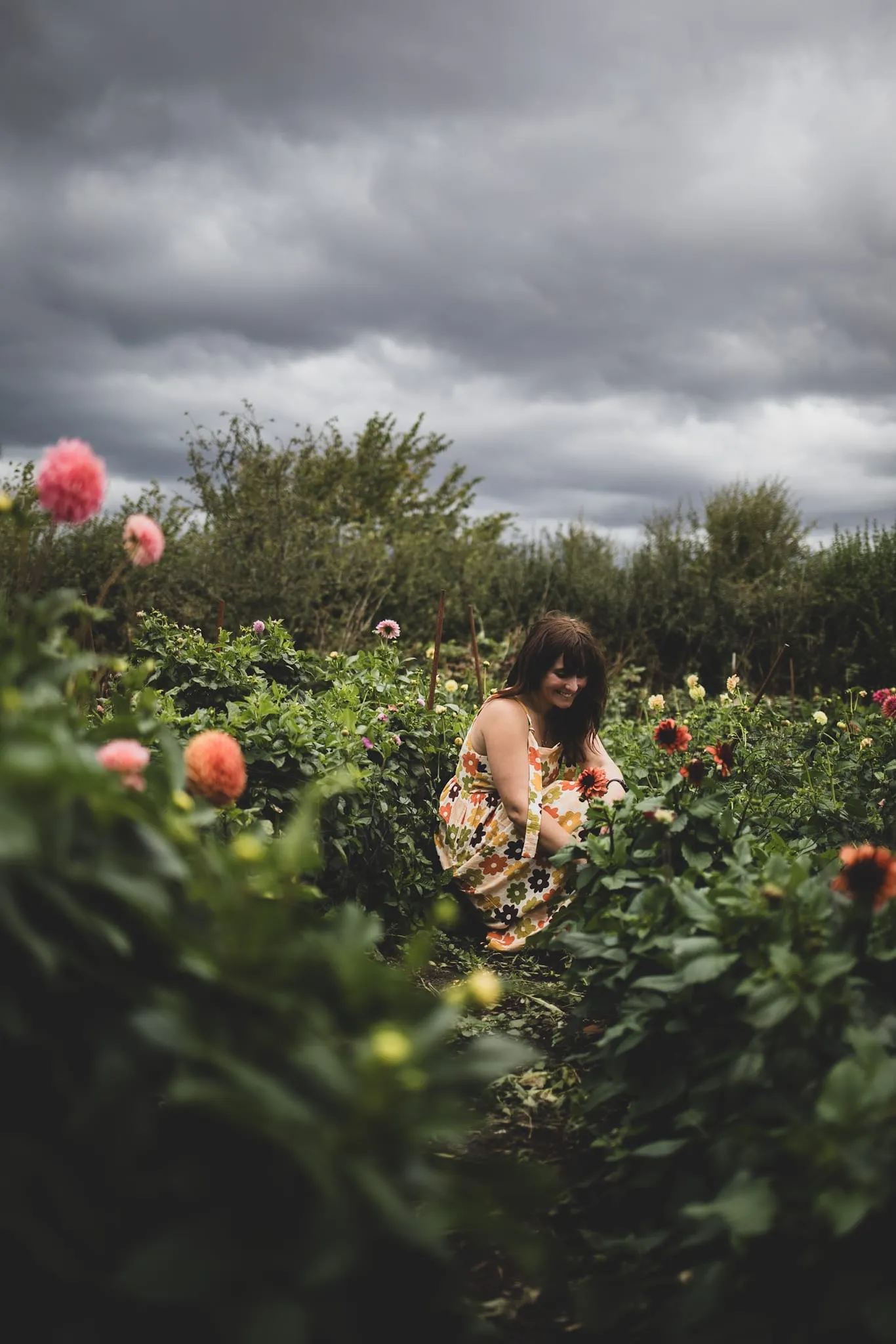 Laurenne in the dahlia rows at the flower farm