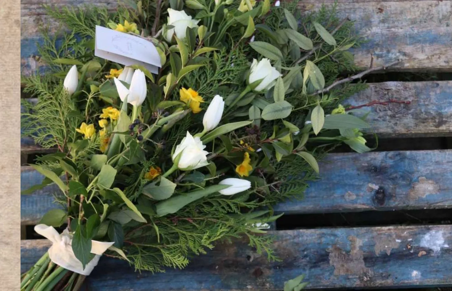 White tulip funeral sheaf