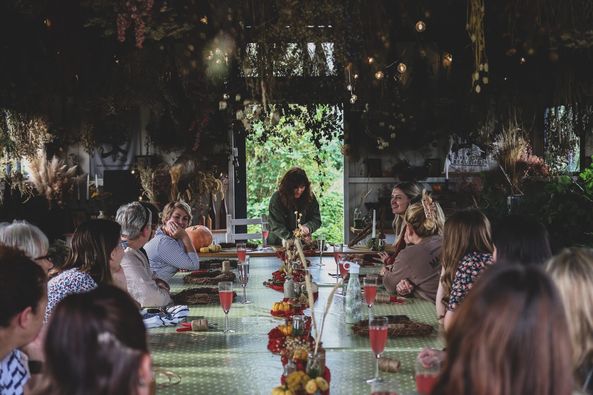 An autumn workshop table set for making wreaths